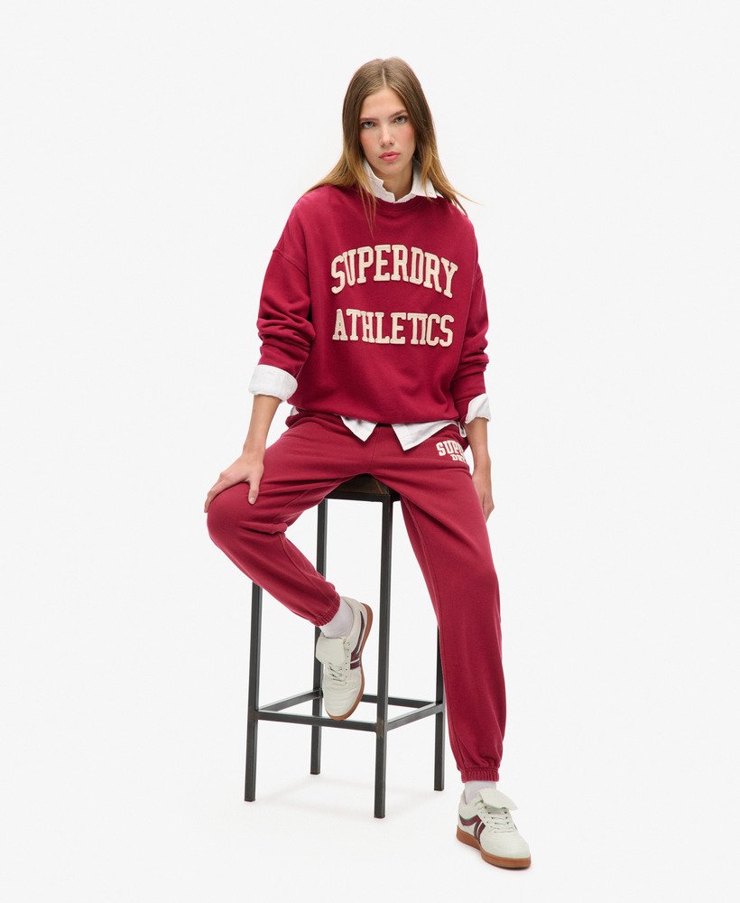 spodnie dresowe athletic essentials boyfriend w kolorze bordowo-czerwonym