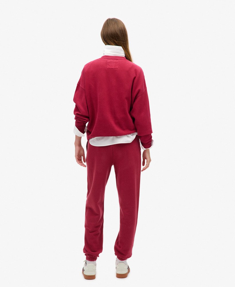 spodnie dresowe athletic essentials boyfriend w kolorze bordowo-czerwonym
