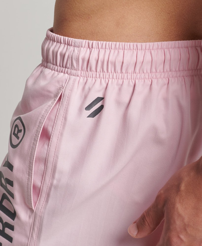 szorty kąpielowe core sport 17 cali z recyklingu w kolorze montauk pink