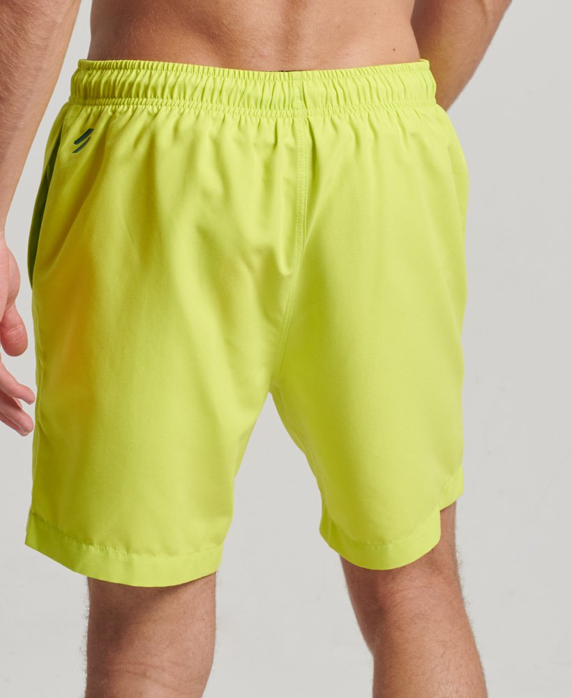 spodenki kąpielowe core sport 17 cali z recyklingu w kolorze limonkowym