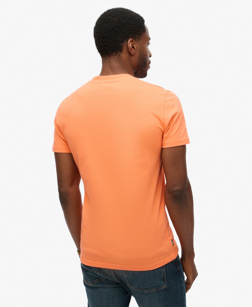 koszulka z organicznej bawełny essential z dekoltem w serek i logo w kolorze sunburst coral