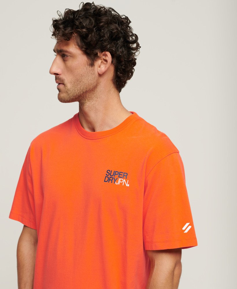 luźna koszulka z logo sportswear w kolorze ognistopomarańczowym