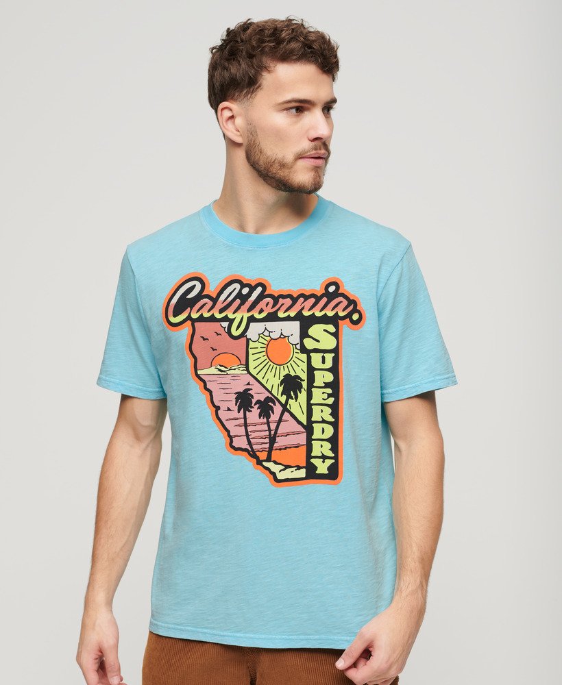 luźna koszulka z grafiką neon travel w kolorze kingfisher blue slub