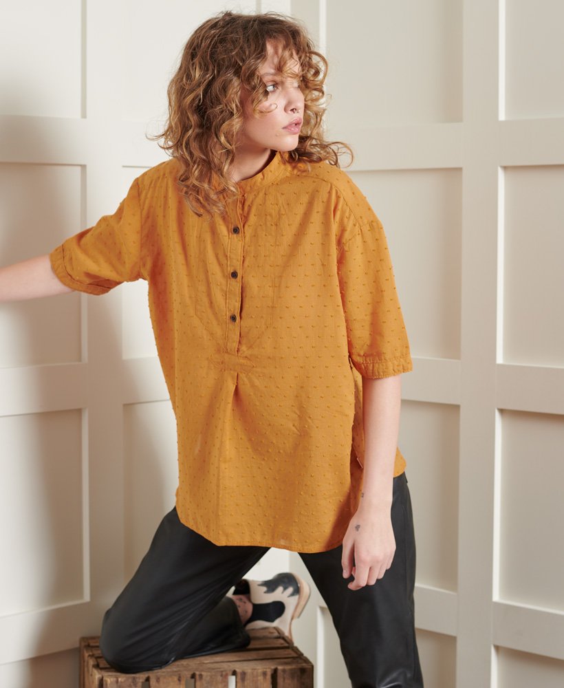 bluzka z kołnierzykiem dry henley w limitowanej edycji o fakturze kurkumy