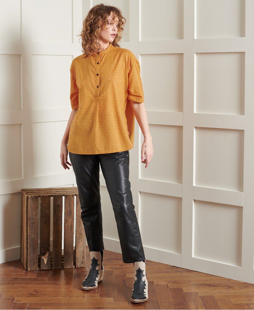 bluzka z kołnierzykiem dry henley w limitowanej edycji o fakturze kurkumy