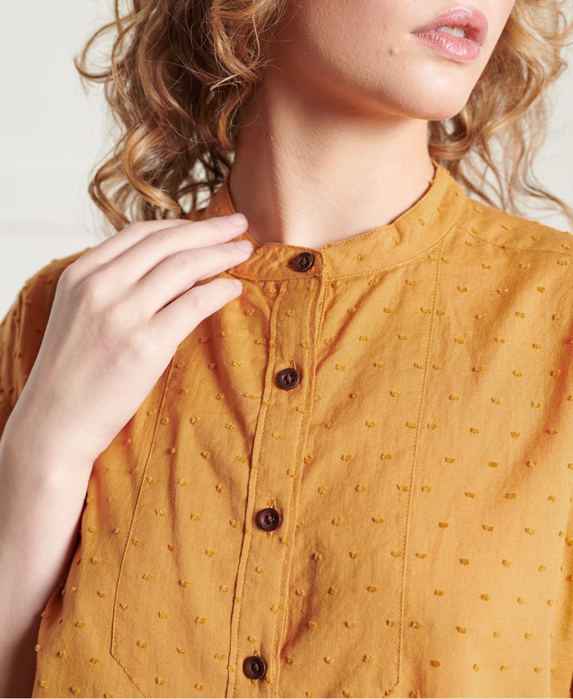 bluzka z kołnierzykiem dry henley w limitowanej edycji o fakturze kurkumy