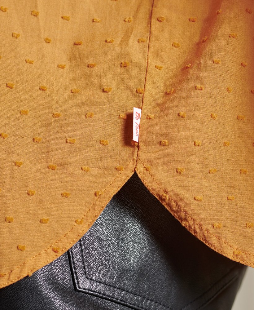 bluzka z kołnierzykiem dry henley w limitowanej edycji o fakturze kurkumy