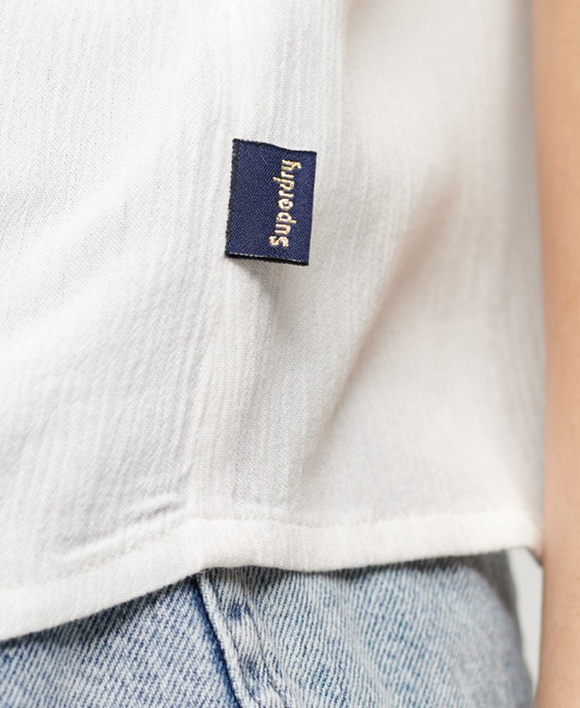 haftowany top na ramiączkach w kolorze off white