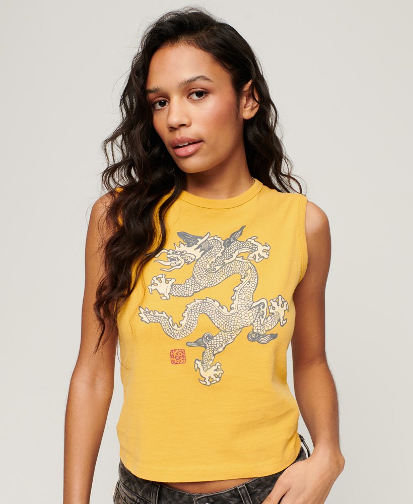 koszulka bez rękawów superdry x komodo vintage w kolorze żółtym pigmentowym