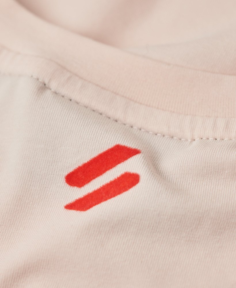 sportowy dopasowany top z grafiką luxe w kolorze mauve morn pink