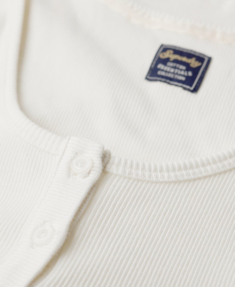 koszulka bez rękawów athletic essentials zapinana na guziki w kolorze off white