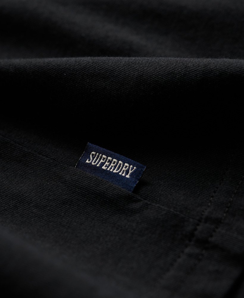czarny organiczny bawełniany top z logo essential