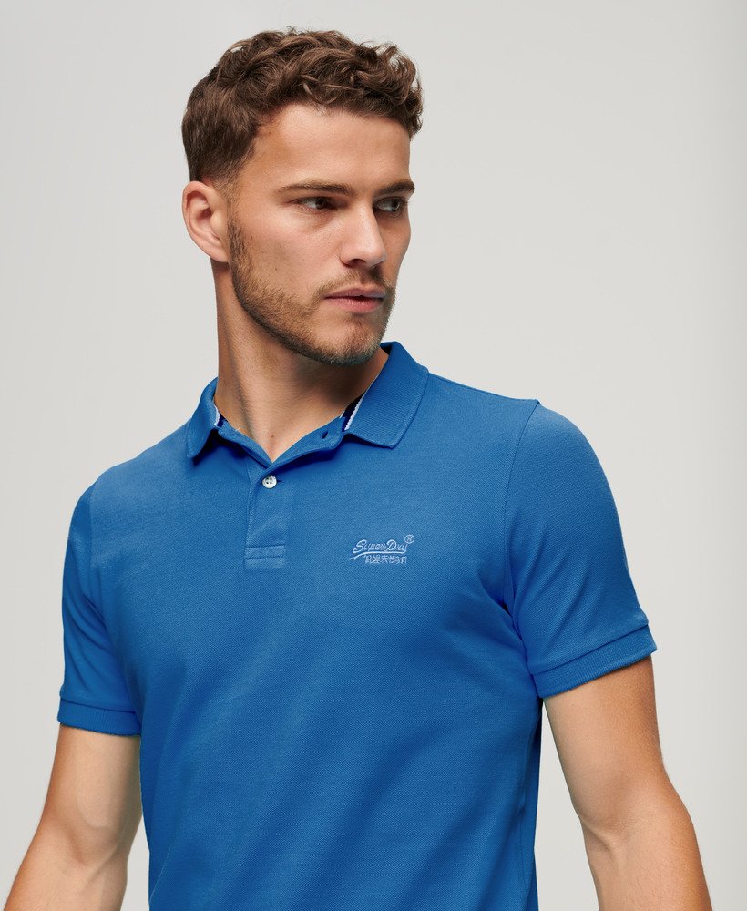 zniszczona koszulka polo w kolorze monaco blue