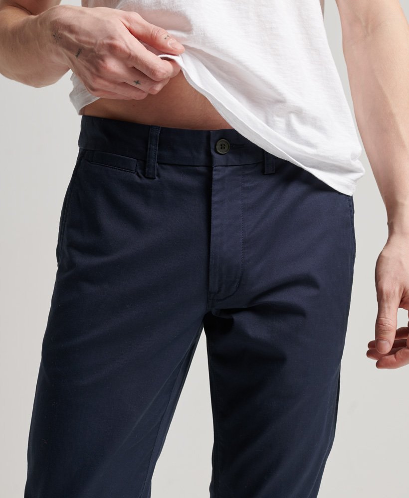 dopasowane zwężane elastyczne chinosy w kolorze rinse navy