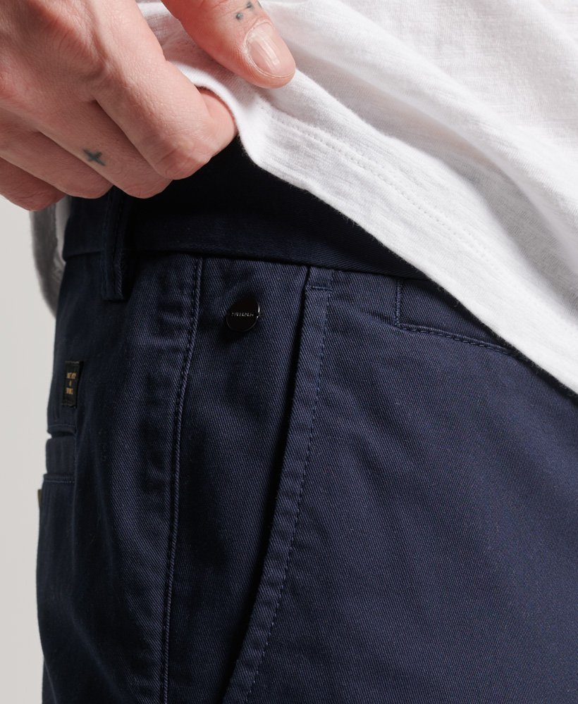 dopasowane zwężane elastyczne chinosy w kolorze rinse navy