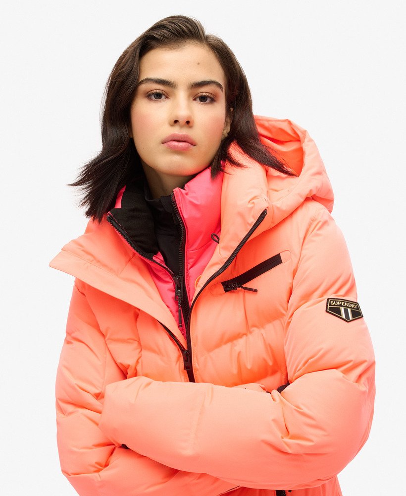 kurtka puchowa ski luxe w kolorze pastelowego koralu